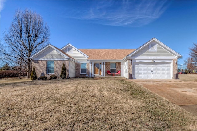 single story home with driveway, a front lawn, an attached garage, and brick siding