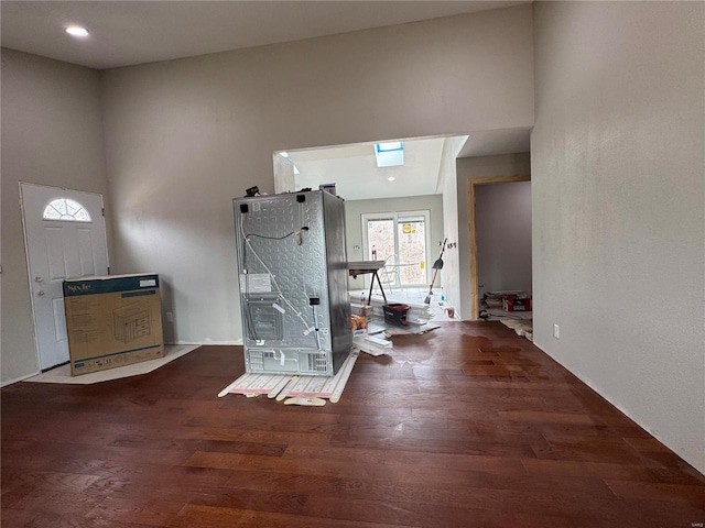 interior space with recessed lighting and wood finished floors