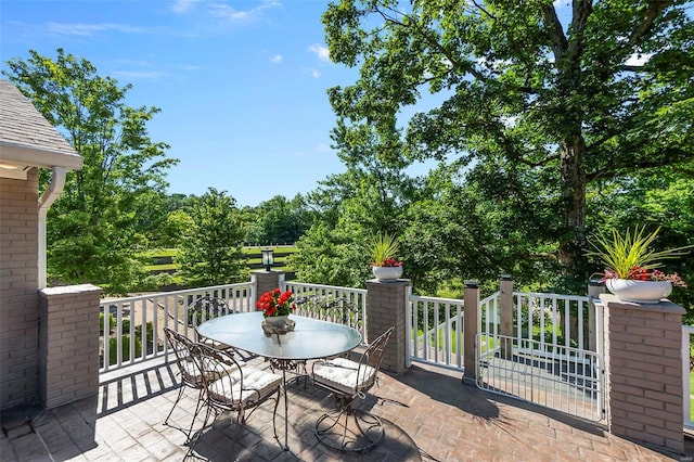 view of patio featuring outdoor dining area