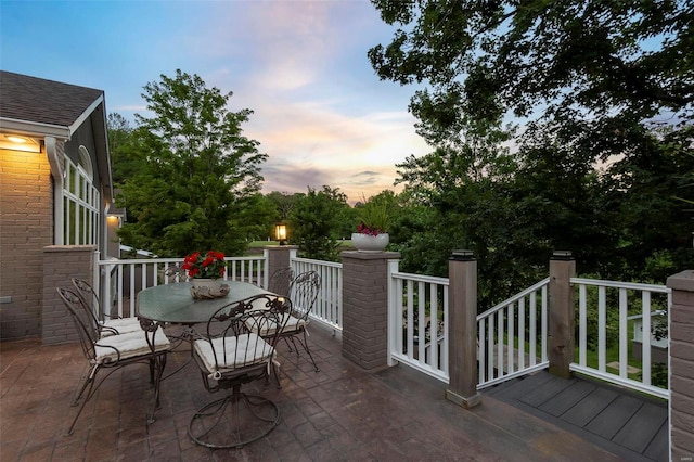 deck featuring outdoor dining area