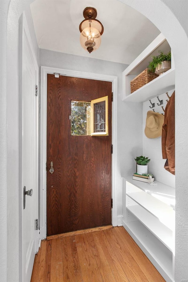 entryway with light wood finished floors