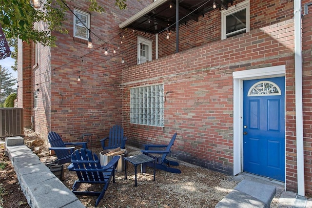 property entrance with brick siding