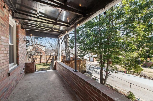 view of patio with fence