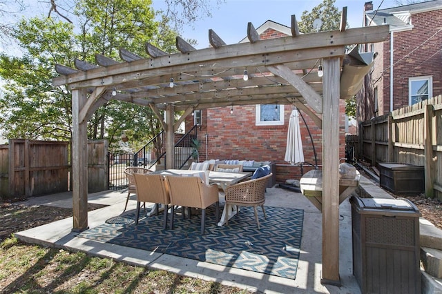 view of patio featuring outdoor dining space, a pergola, outdoor lounge area, and a fenced backyard