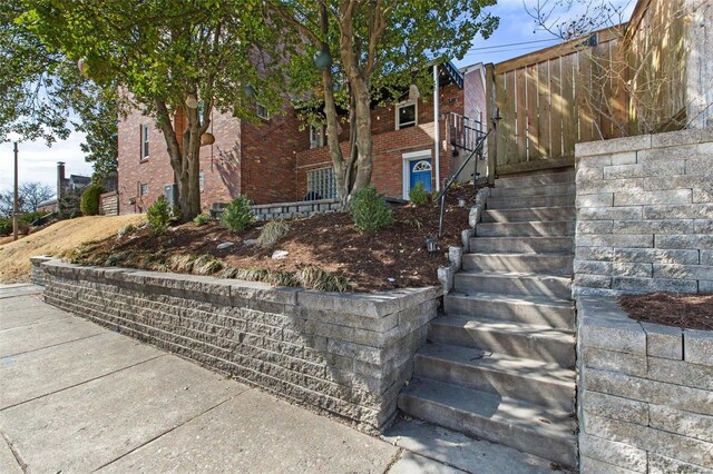 details with stairs and brick siding