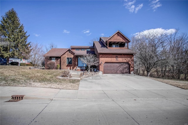 view of front facade with a garage and driveway