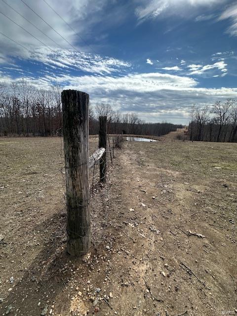 exterior space with a rural view