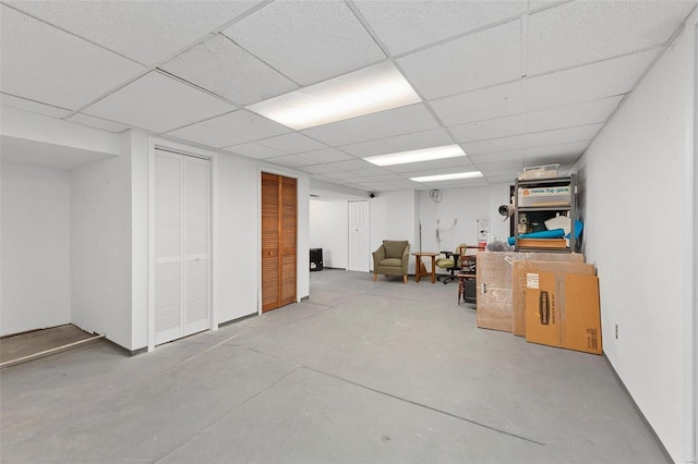 finished basement with a drop ceiling