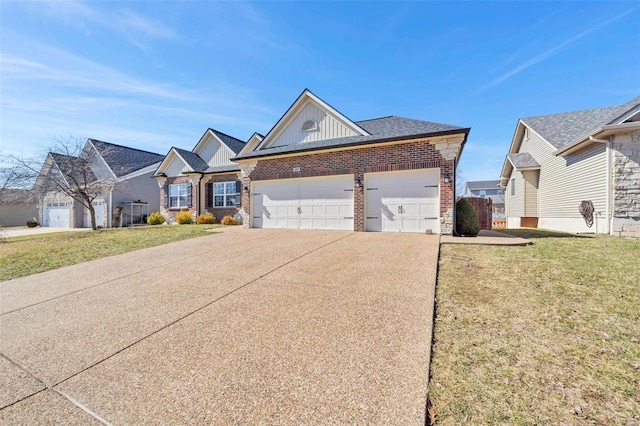 view of front of property with board and batten siding, concrete driveway, an attached garage, a front yard, and brick siding