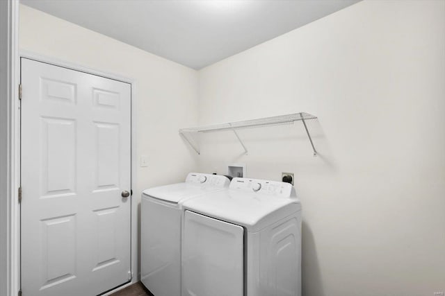 washroom with laundry area and washer and clothes dryer