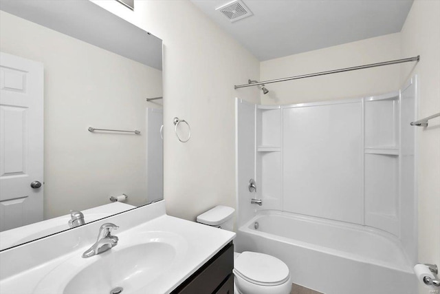 bathroom featuring toilet, washtub / shower combination, visible vents, and vanity