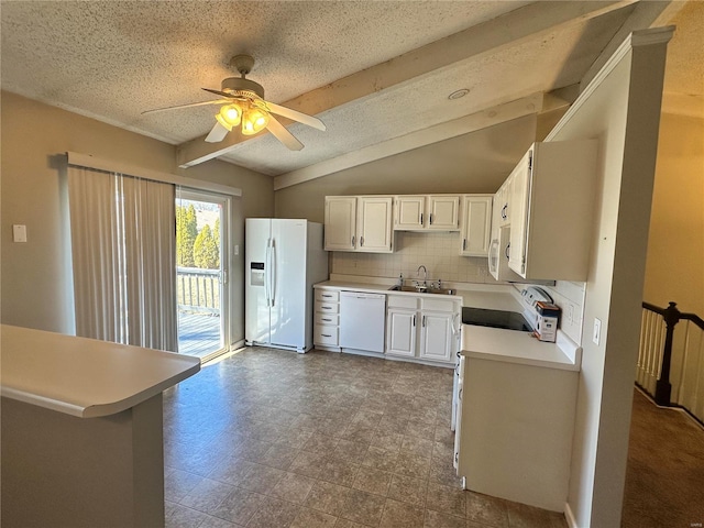 kitchen with white appliances, lofted ceiling with beams, a sink, light countertops, and backsplash