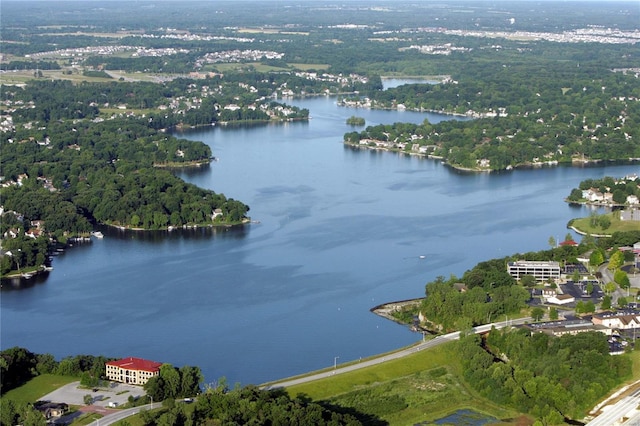 bird's eye view featuring a water view and a view of trees