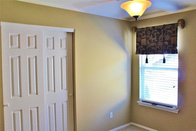 unfurnished bedroom featuring baseboards