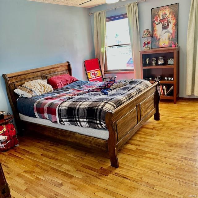 bedroom with light wood-type flooring