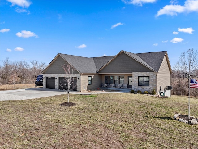 view of front of house with stone siding, an attached garage, concrete driveway, and a front lawn