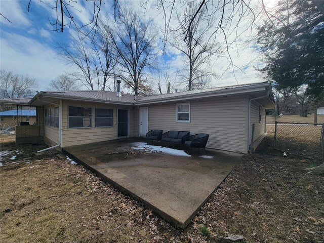 back of house with an outdoor hangout area, a patio, and fence