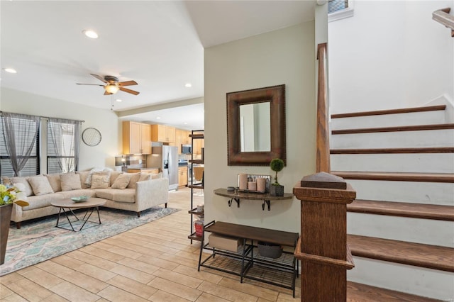 living room with wood tiled floor, stairway, recessed lighting, and ceiling fan