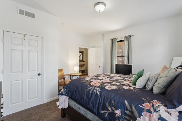 bedroom with visible vents, baseboards, and carpet