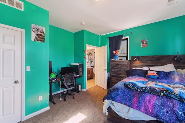 bedroom with carpet, visible vents, and baseboards