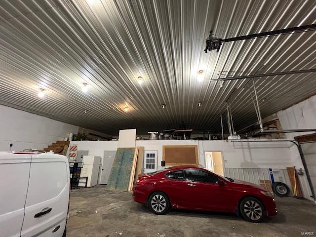 garage featuring metal wall