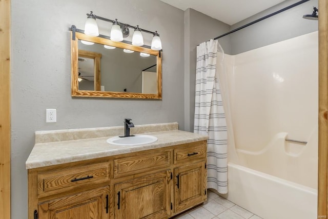 bathroom featuring shower / bath combo, tile patterned flooring, and vanity