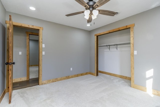 unfurnished bedroom featuring recessed lighting, a closet, a ceiling fan, carpet flooring, and baseboards