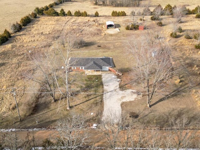 birds eye view of property featuring a rural view