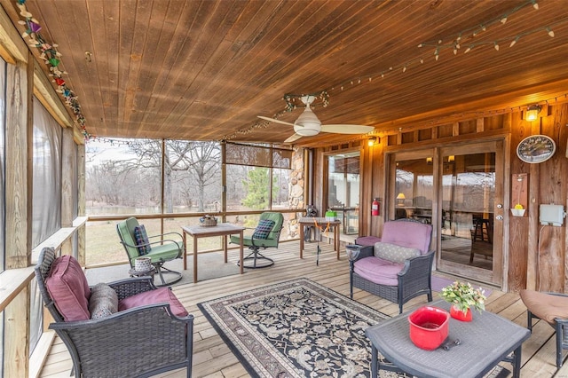 sunroom / solarium featuring wood ceiling