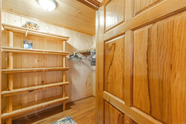 spacious closet featuring hardwood / wood-style flooring