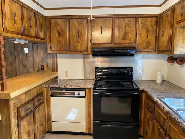 kitchen with brown cabinets, black electric range oven, range hood, white dishwasher, and a sink