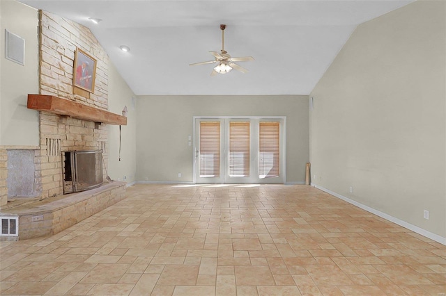 unfurnished living room with high vaulted ceiling, a fireplace, baseboards, and a ceiling fan