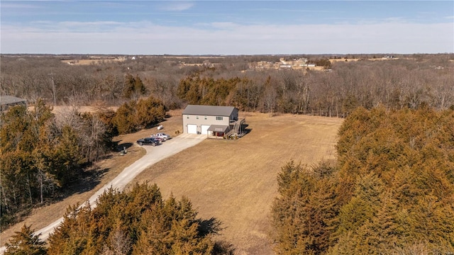 aerial view with a wooded view