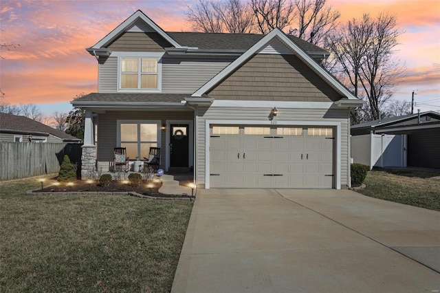 craftsman-style house with fence, a porch, concrete driveway, a yard, and a garage