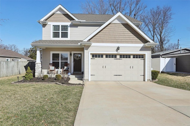 craftsman-style home featuring a porch, an attached garage, a front lawn, and fence