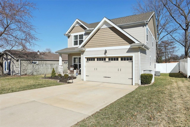 traditional home featuring fence, a front yard, cooling unit, a garage, and driveway