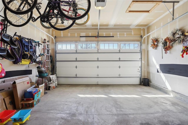 garage featuring a garage door opener