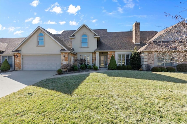 view of front facade featuring a chimney, stucco siding, a front yard, stone siding, and driveway