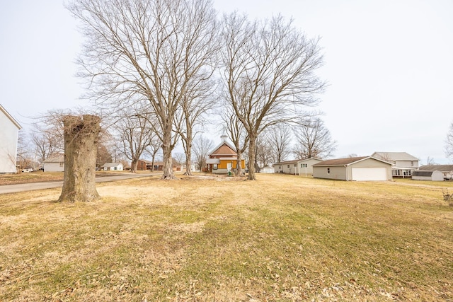 view of yard featuring a garage