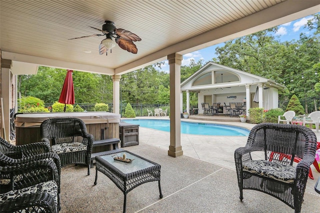 view of patio featuring outdoor dining area, an outdoor living space, a ceiling fan, an outdoor pool, and a hot tub