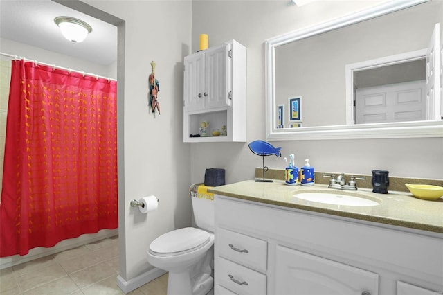 full bath featuring curtained shower, vanity, toilet, and tile patterned floors