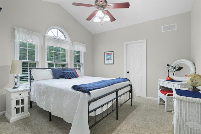 bedroom with lofted ceiling, carpet floors, a ceiling fan, visible vents, and baseboards