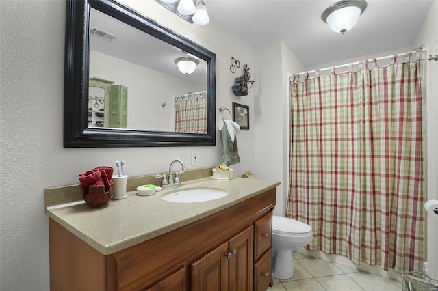 full bath featuring visible vents, toilet, vanity, a shower with curtain, and tile patterned floors