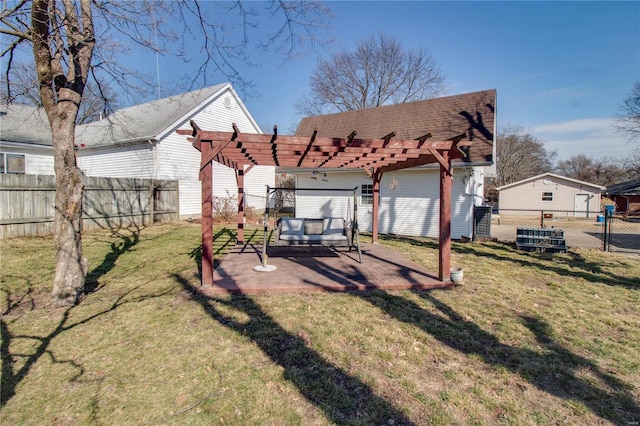 view of yard featuring a fenced backyard, a patio, central AC, and a pergola