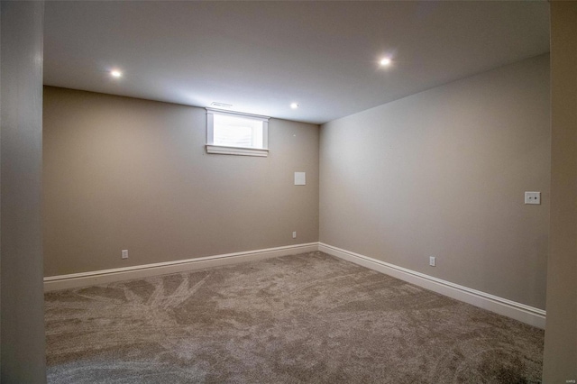 basement featuring carpet floors, recessed lighting, and baseboards