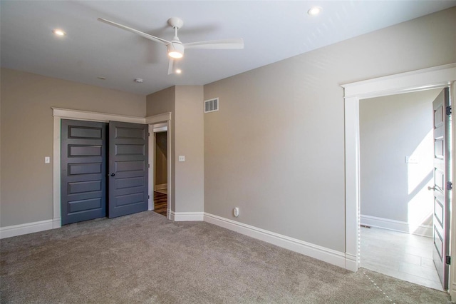 unfurnished bedroom featuring recessed lighting, a closet, visible vents, carpet flooring, and baseboards