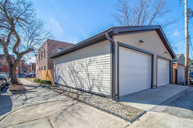 detached garage with fence