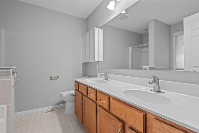 full bath with a shower with shower door, a sink, visible vents, and tile patterned floors