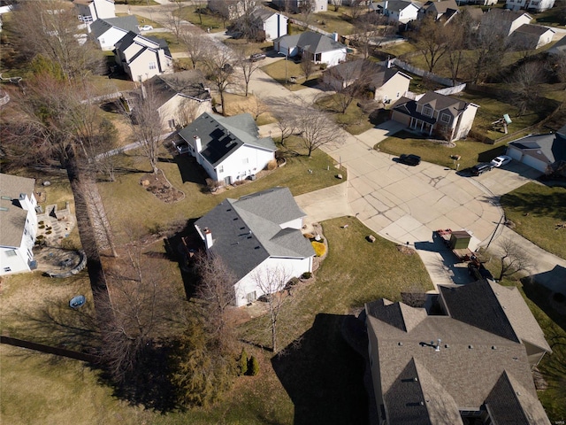 birds eye view of property with a residential view