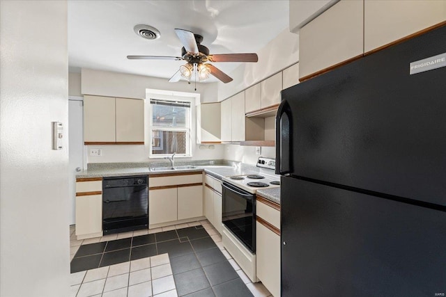 kitchen with tile patterned flooring, a sink, visible vents, a ceiling fan, and black appliances